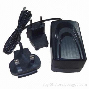 AC/DC adapter with interchangeable plug
